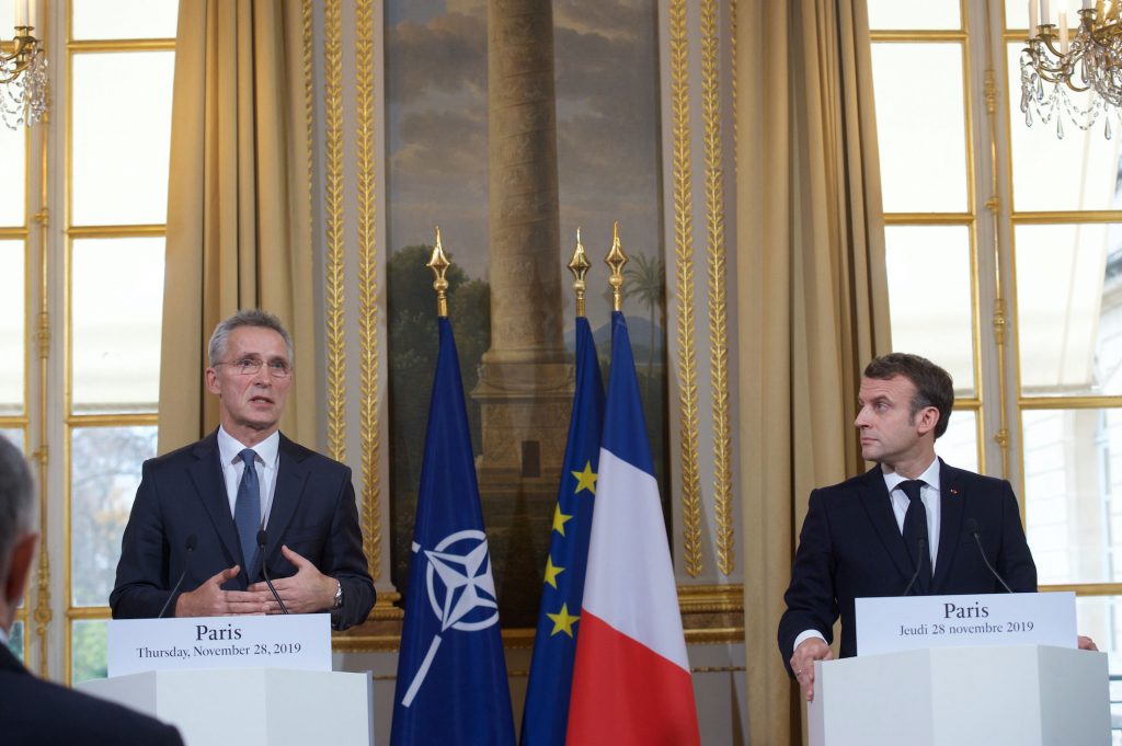 Jens Stoltenberg (l.) and Emmanuel Macron at NATO summit